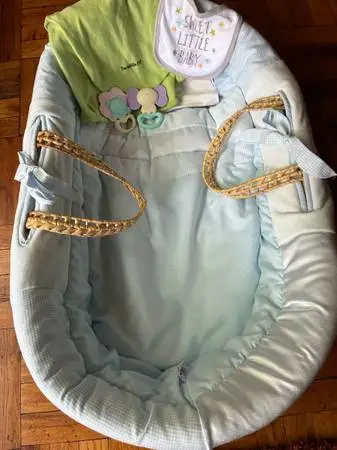 Baby moses basket/ portable bassinet+ some extras