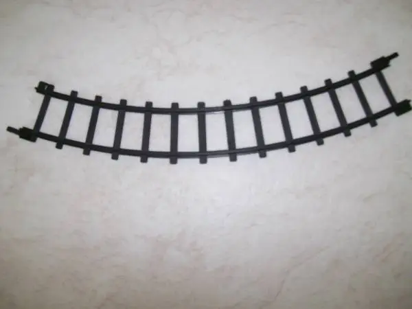 WANTED - ONE 12 INCH CURVED PLASTIC TOY RAIL TRACK FOR TOYS FOR TOTS