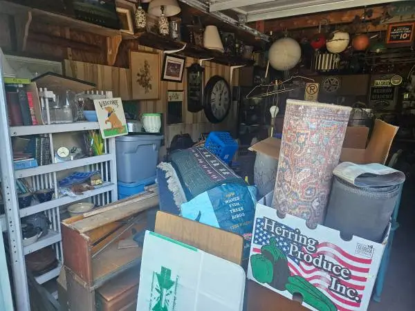 Garage full of vintage antique furniture more