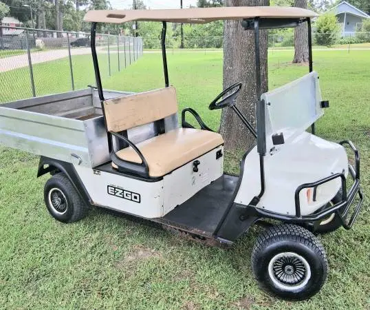 GAS EZGO UTILITY GOLF CART. $1500