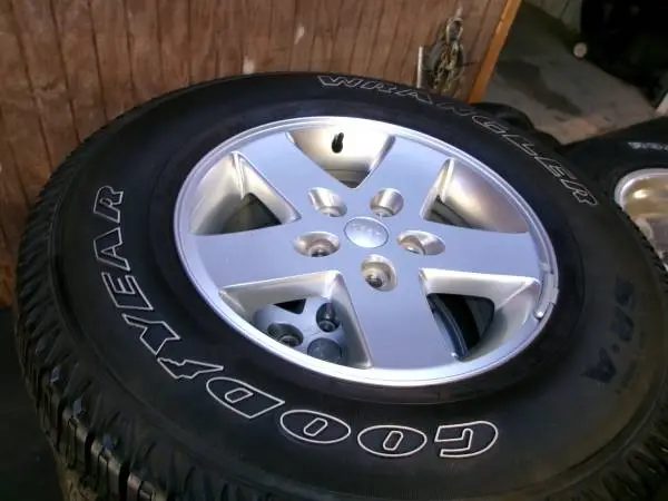 5- Jeep Wrangler wheels with Goodyear Wrangler 255/75R17 tires