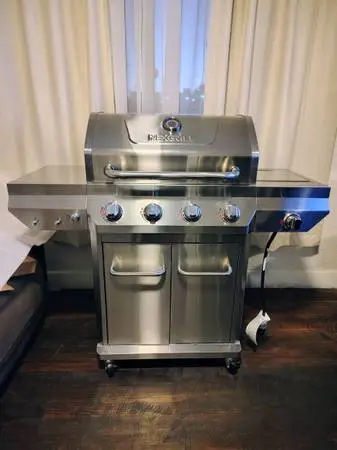 New. NexGrill 4 Burner Stainless Steel Propane Gas Grill with Side Burner.