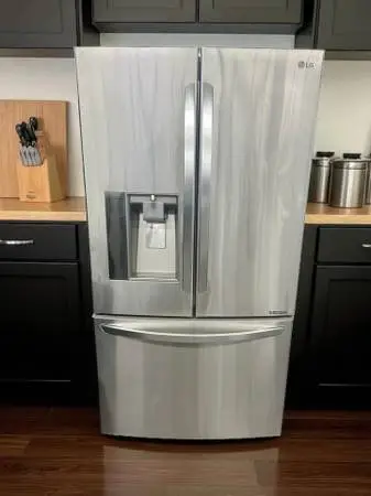 LIKE NEW - LG 24 cu. ft. French Door Counter-Depth Stainless Steel Ref