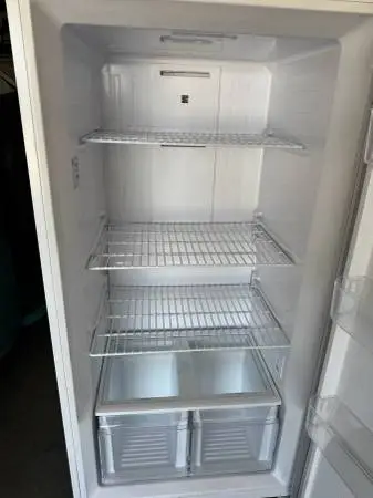 upright large Kenmore freezer
