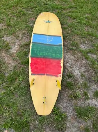 Surfboard 7’5”  quiet flight