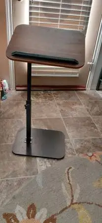 Rolling adjustable table