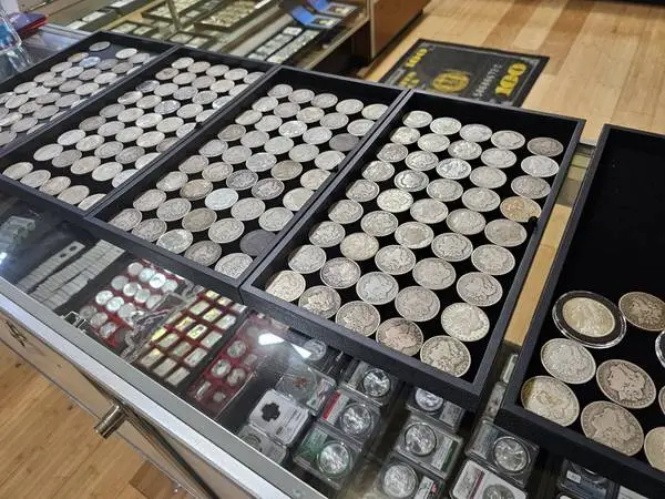 BUYING COIN COLLECTIONS LARGE AND SMALL