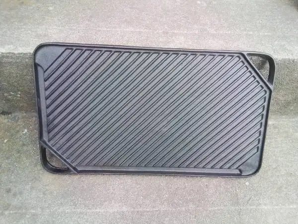 New 2 sided cast iron griddle, 17x9&1/2