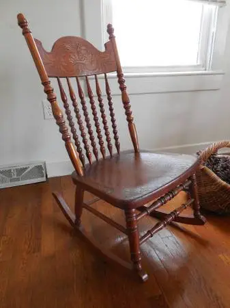 Antique Spindle Pressed Back Rocking Chair