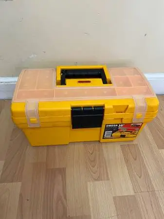Nails with yellow toolbox