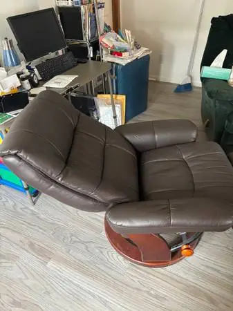 Stressless Swivel reclining chair with ottoman.