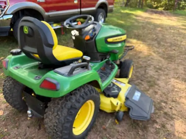 John Deere garden tractor model X 520  excelent condition