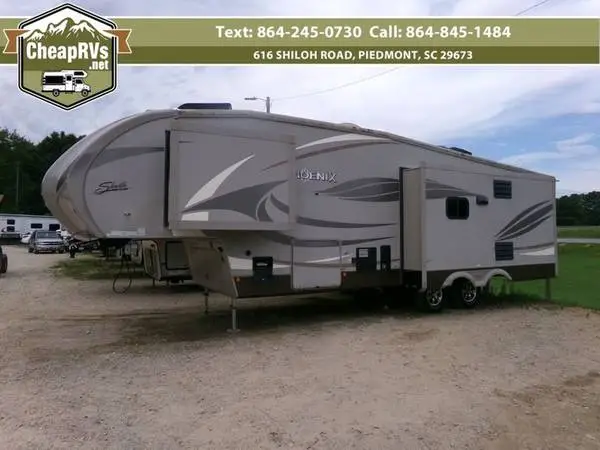 2015 Forest River Shasta Phoenix 3 slides fireplace big rear living @