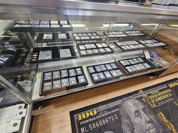 BUYING COIN COLLECTIONS LARGE AND SMALL