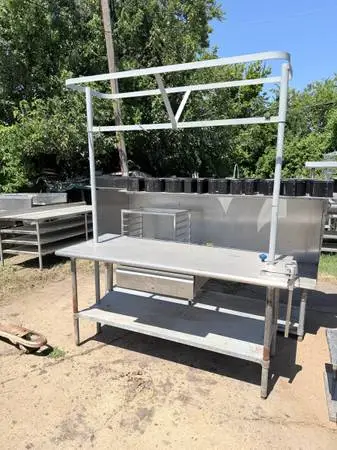Stainless steel table with pan rack
