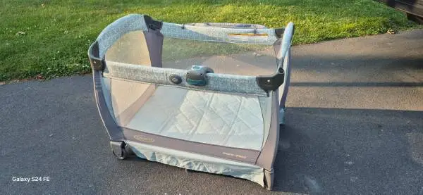 Graco Pack N Play with Cover, Side Tray, and Music