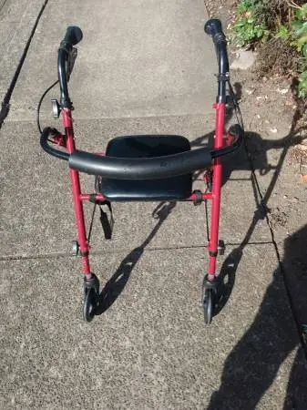 Walker with hand brakes very little used same as new