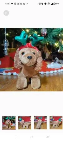 Stuffed dog with reindeer head band.
