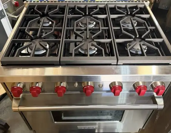 Wolf Stainless Steel 36” Wide Gas Range/Subzero 42” Built In Fridge
