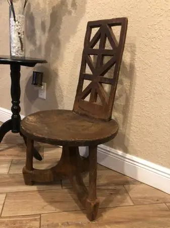 Up for sale is a stunning, authentic antique Ethiopian tribal chair, hand-carved