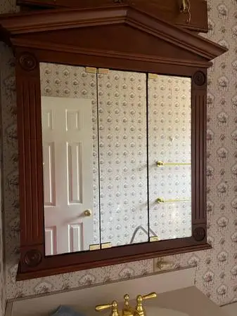 elegant solid wood wood medicine cabinet with mirrored doors