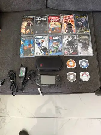 Sony psp and 15 games great condition asking $275