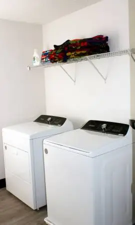 High-Efficiency Whirlpool Washer & Electric Moisture Sensing Dryer