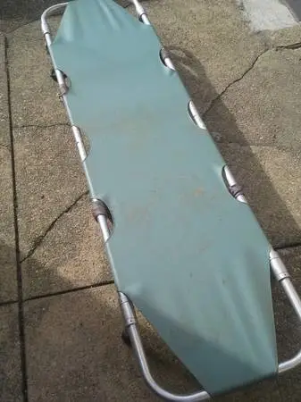 Ferno Washington model 11 folding flat stretcher with wheels