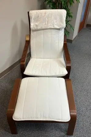 Poang chair and ottoman - walnut stain, off-white cushions