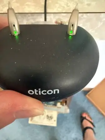 Oticon  hearing aids with charger