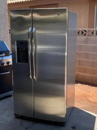 GE STAINLESS STEEL REFRIGERATOR SIDE BY SIDE