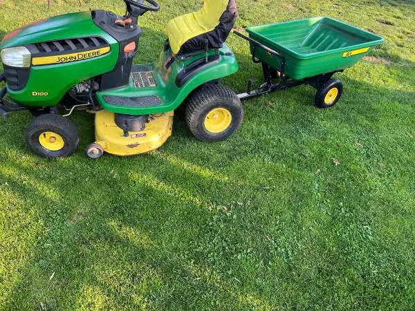 John Deere D 100 with dump cart brand new trailer tires