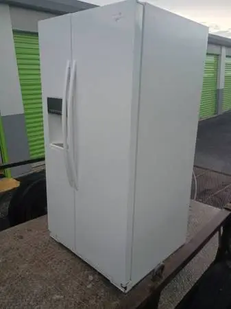 LARGE WHIRLPOOL DOUBLE DOOR FRIDGE