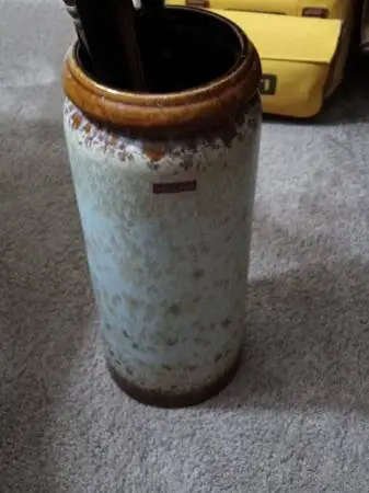 CANES AND POTTERY HOLDER