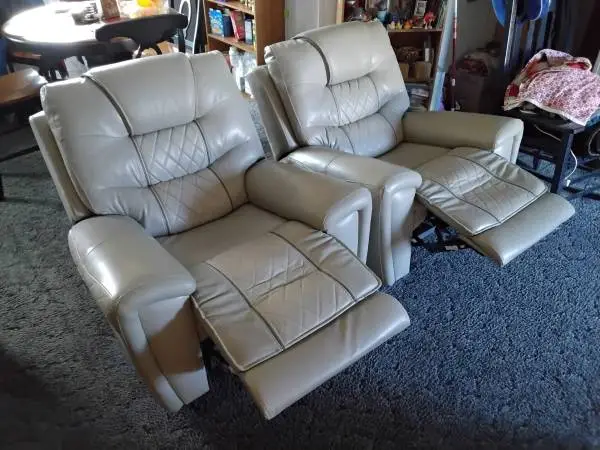 Two 2023 R&F Beige plush leather recliners