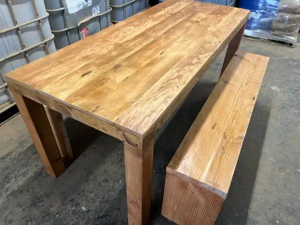 wood dining table with two benches