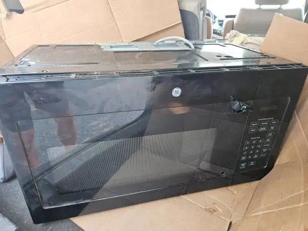 GE 1.6-cu ft Over-the-Range Microwave Works perfectly, broken handle