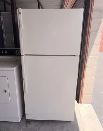 White GE Refrigerator And Freezer