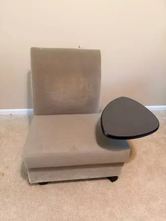 2 rolling sofa chairs with tablet arm