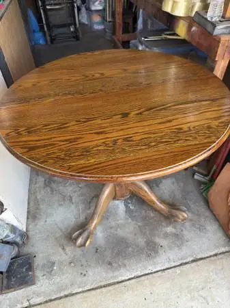 Oak table with six chairs and leave