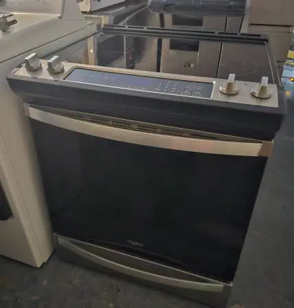 WHIRLPOOL STAINLESS STEEL SLIDE IN GLASSTOP STOVE CONVECTION OVEN....