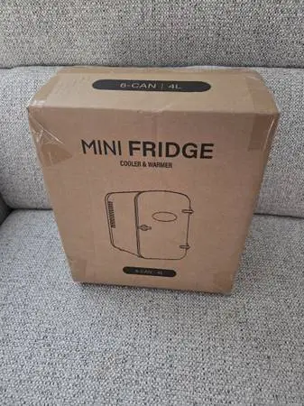 Brand new mini fridge in Box never been used before
