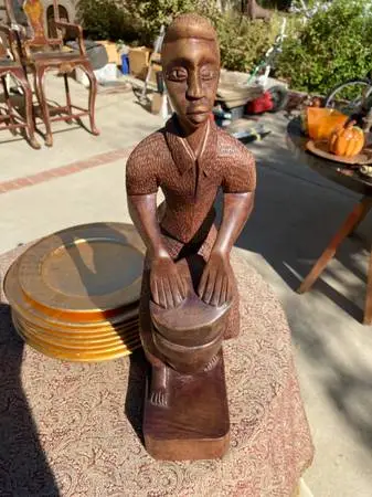 African statues made of curved wood