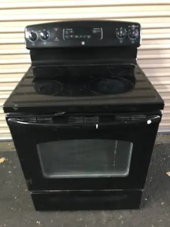 GE Electric Stove, Glass Top, Self-cleaning oven, Works Great