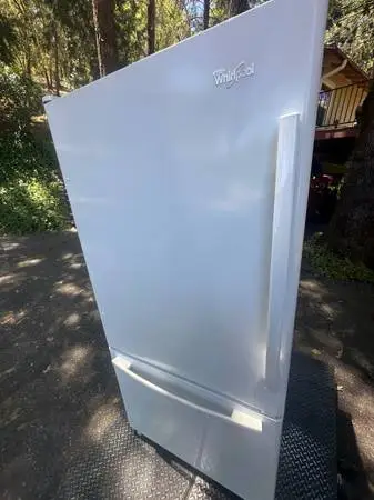 White whirlpool refrigerator will deliver and install