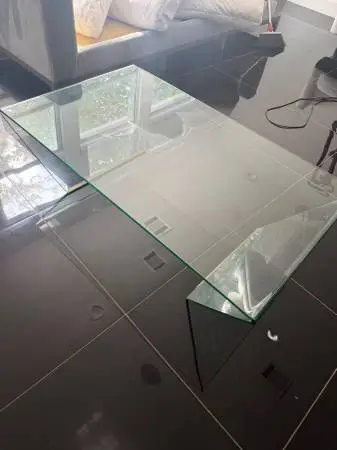 Beautiful all-glass coffee table for sale. Excellent condition.