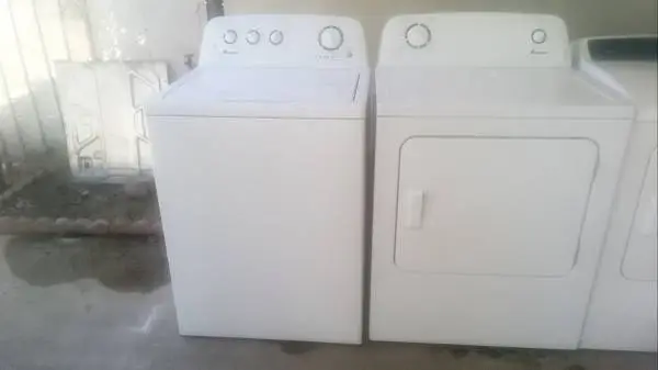 Whirlpool and Maytag washer and dryer set with warranty