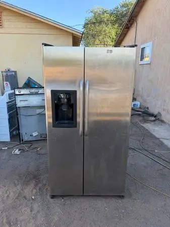 GE Silver Stainless Steel Refrigerator For Sale $250 Or Best Offer