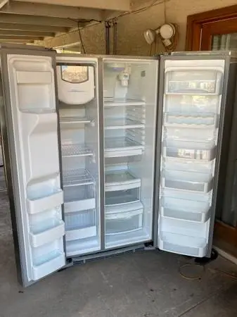 GE REFRIGERATOR STAINLESS STEEL SIDE BY SIDE