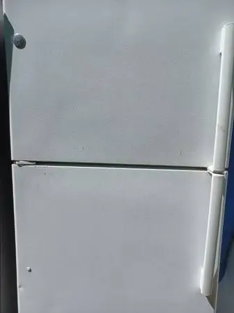 Refrigerator top freezer 3 months warranty